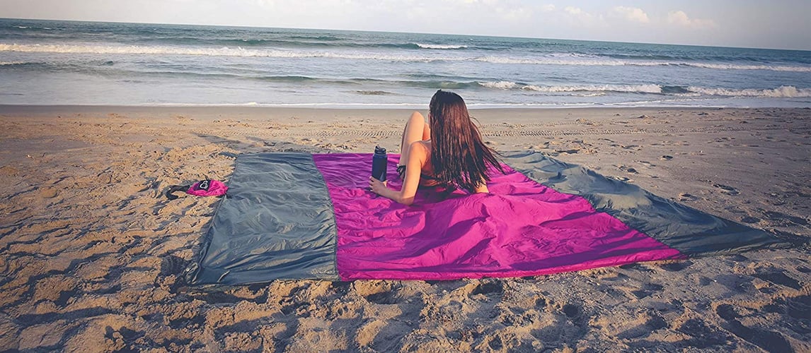 beach blanket where sand falls through